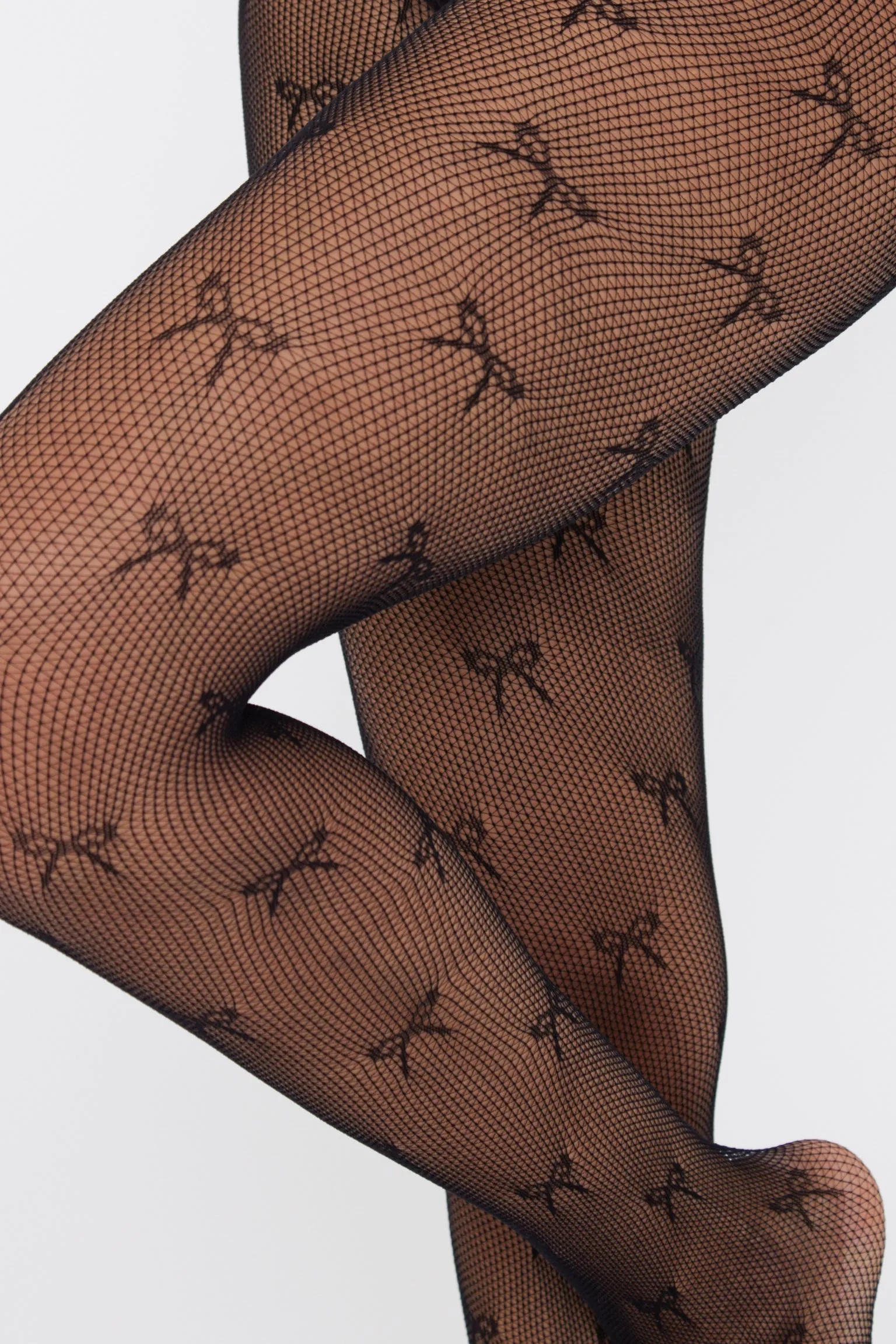 Bow Fishnet Tights in Black